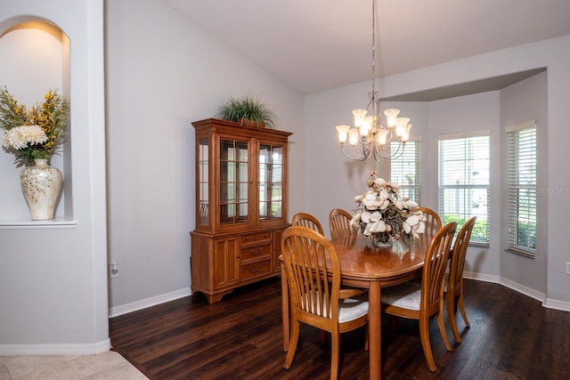916 Bunker View Dr, Apollo Beach, FL 33572 - dining space featuring a chandelier, lofted ceiling, and dark wood finished floors
