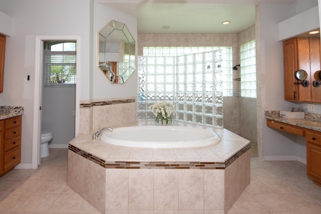 916 Bunker View Dr, Apollo Beach, FL 33572 - full bath featuring vanity, a bath, and tile patterned floors