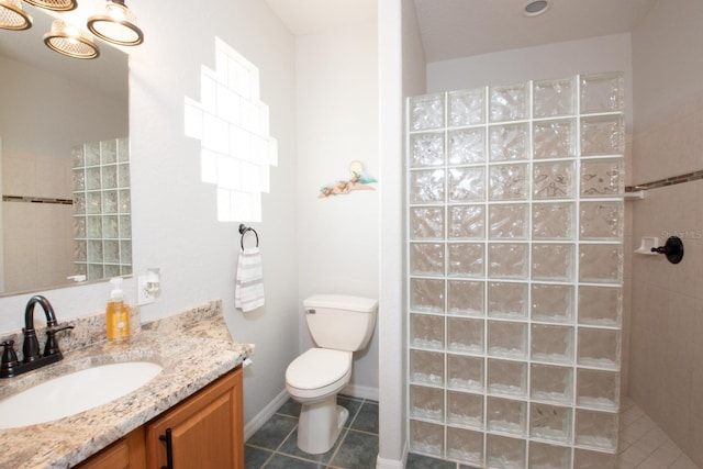 916 Bunker View Dr, Apollo Beach, FL 33572 - bathroom with vanity, walk in shower, and tile patterned flooring