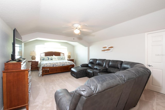 916 Bunker View Dr, Apollo Beach, FL 33572 - bedroom with light carpet, lofted ceiling, a ceiling fan, and a textured ceiling