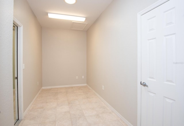 916 Bunker View Dr, Apollo Beach, FL 33572 - corridor featuring attic access and baseboards