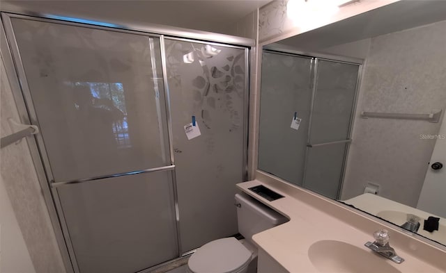 642 Bird Bay Dr E Unit 205, Venice, FL 34285 - bathroom featuring a shower with door and vanity