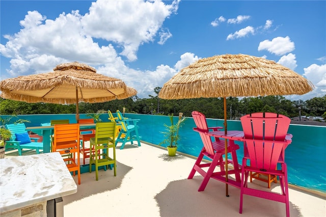 6210 64th Way N, Pinellas Park, FL 33781 - view of swimming pool featuring a patio