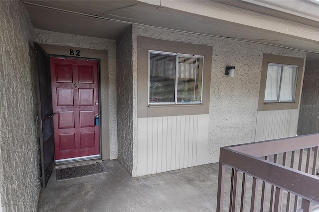 6332 Newtown Cir Unit 32B2, Tampa, FL 33615 - property entrance featuring stucco siding