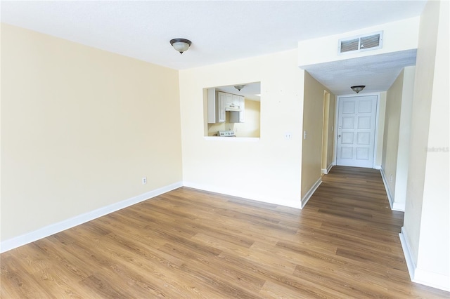 6332 Newtown Cir Unit 32B2, Tampa, FL 33615 - empty room featuring wood finished floors and baseboards