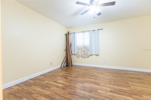 6332 Newtown Cir Unit 32B2, Tampa, FL 33615 - unfurnished room with light wood finished floors, a ceiling fan, and lofted ceiling