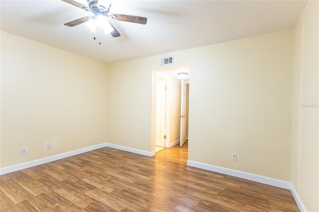 6332 Newtown Cir Unit 32B2, Tampa, FL 33615 - unfurnished room with light wood finished floors and a ceiling fan