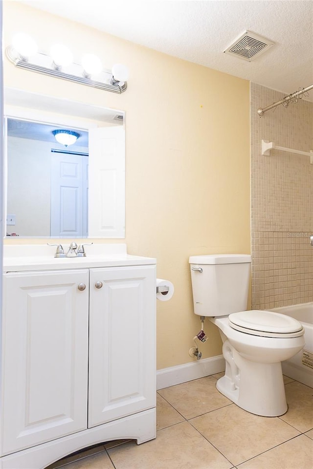 6332 Newtown Cir Unit 32B2, Tampa, FL 33615 - bathroom with tile patterned flooring, vanity, shower / tub combination, and a textured ceiling