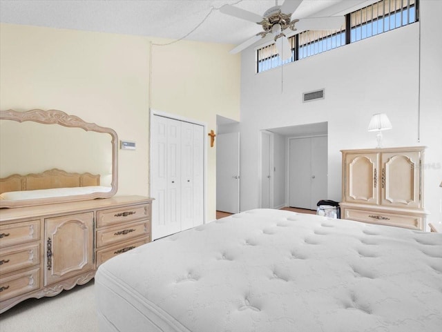 15711 Springmoss Ln, Tampa, FL 33624 - bedroom with a towering ceiling, a closet, and ceiling fan