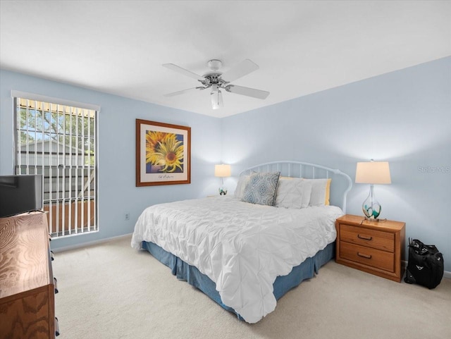 15711 Springmoss Ln, Tampa, FL 33624 - bedroom with carpet floors and a ceiling fan