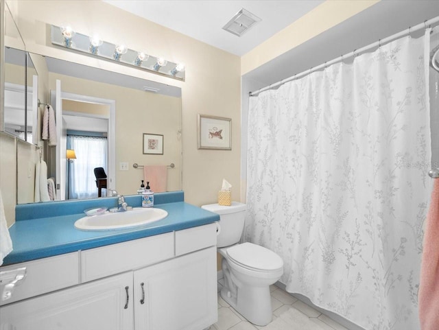 15711 Springmoss Ln, Tampa, FL 33624 - full bath featuring vanity and tile patterned floors