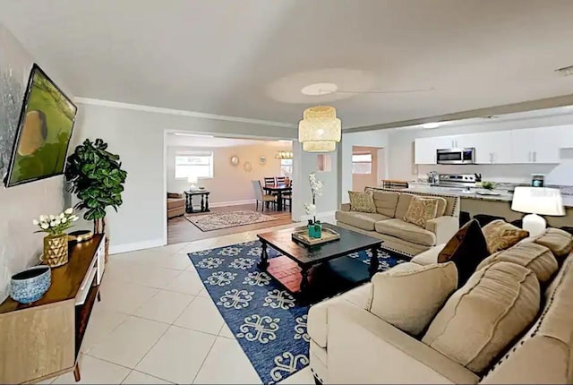 4505 S Clark Ave, Tampa, FL 33611 - living area featuring light tile patterned floors and crown molding