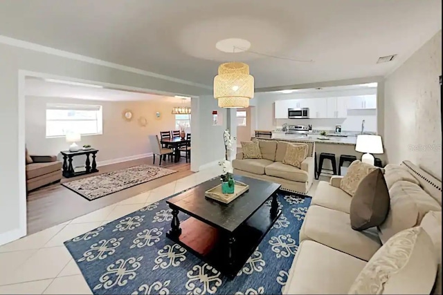 4505 S Clark Ave, Tampa, FL 33611 - living area featuring tile patterned flooring