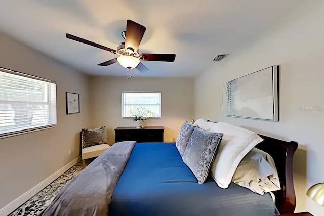 4505 S Clark Ave, Tampa, FL 33611 - bedroom featuring baseboards and a ceiling fan