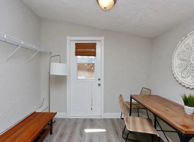 4505 S Clark Ave, Tampa, FL 33611 - dining area with wood finished floors and vaulted ceiling
