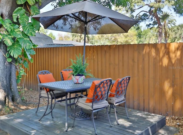4505 S Clark Ave, Tampa, FL 33611 - wooden deck featuring outdoor dining space