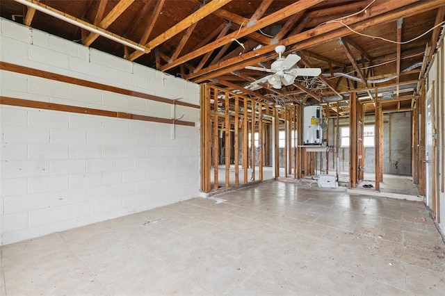 1560 Connecticut Ave NE, Saint Petersburg, FL 33703 - below grade area with ceiling fan and concrete block wall