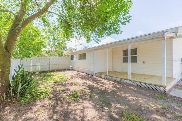 9445 Cardy St, New Port Richey, FL 34654 - back of house with a deck