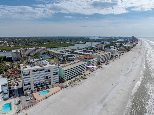 19440 Gulf Blvd Unit 301, Indian Rocks Beach, FL 33785 - bird's eye view of waterfront with a beach and a pool area
