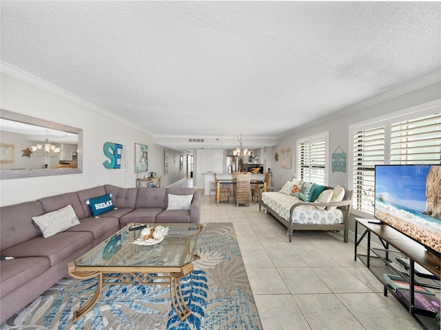 19440 Gulf Blvd Unit 301, Indian Rocks Beach, FL 33785 - living room with a chandelier, crown molding, a textured ceiling, and light tile patterned floors