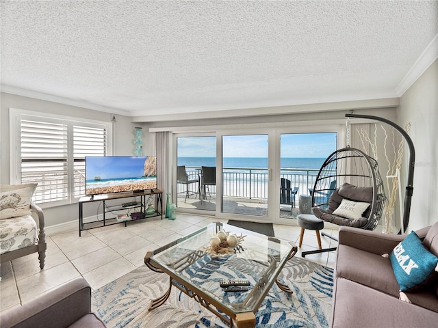 19440 Gulf Blvd Unit 301, Indian Rocks Beach, FL 33785 - living area featuring a textured ceiling, crown molding, and tile patterned floors