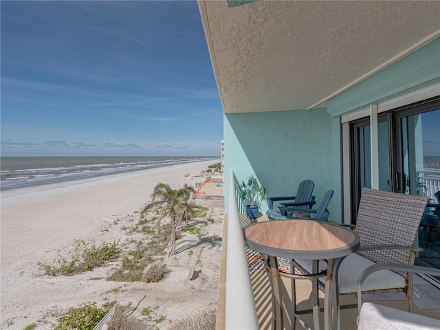 19440 Gulf Blvd Unit 301, Indian Rocks Beach, FL 33785 - balcony featuring view of water and beach
