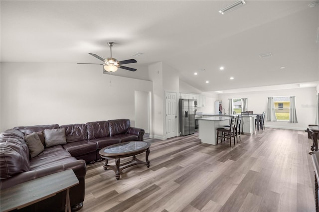 231 Marion Oaks Trl, Ocala, FL 34473 - living room with ceiling fan, light wood-style floors, high vaulted ceiling, and recessed lighting