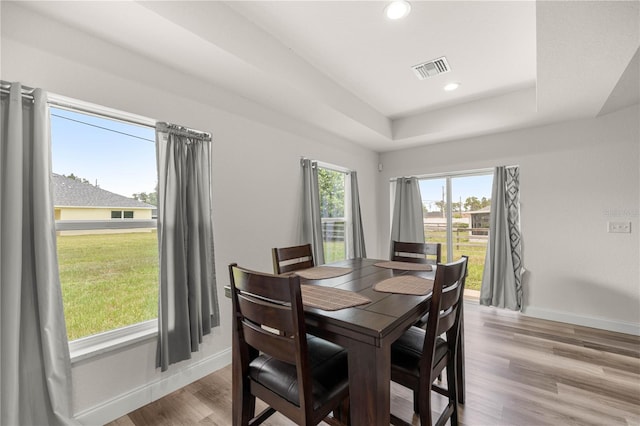 231 Marion Oaks Trl, Ocala, FL 34473 - dining area featuring wood finished floors, a raised ceiling, and recessed lighting