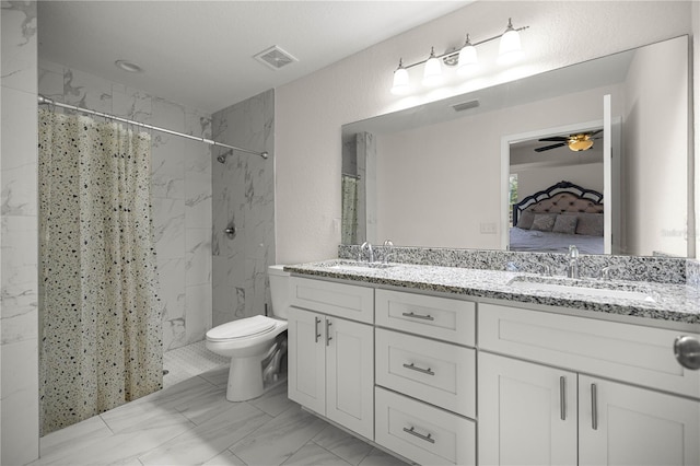 231 Marion Oaks Trl, Ocala, FL 34473 - ensuite bathroom featuring double vanity, ceiling fan, a shower with shower curtain, marble look tile flooring, and a textured wall