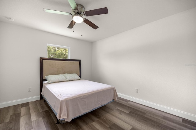 231 Marion Oaks Trl, Ocala, FL 34473 - bedroom with wood finished floors and ceiling fan