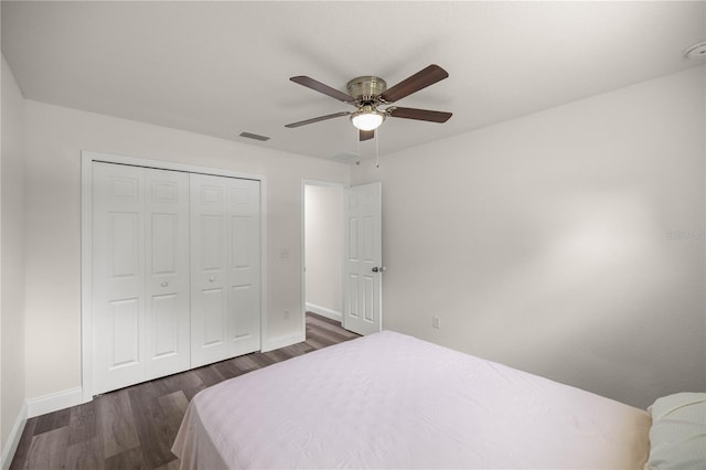 231 Marion Oaks Trl, Ocala, FL 34473 - bedroom featuring dark wood finished floors, a closet, and ceiling fan