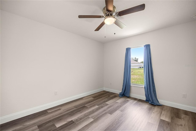 231 Marion Oaks Trl, Ocala, FL 34473 - spare room featuring wood finished floors and a ceiling fan