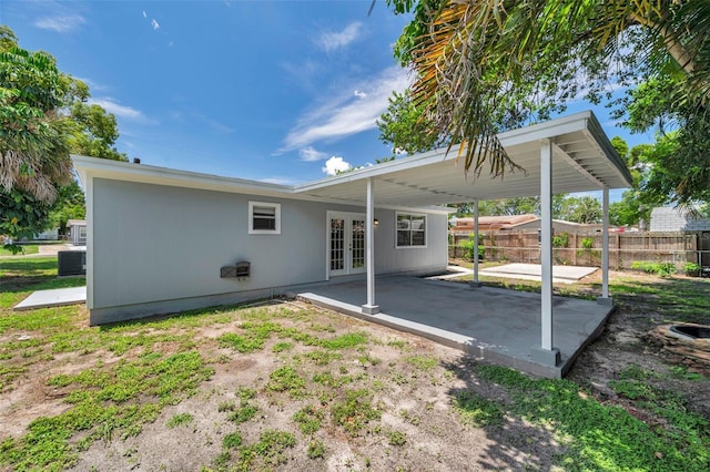 2509 W Crawford St, Tampa, FL 33614 - back of house featuring french doors and a patio