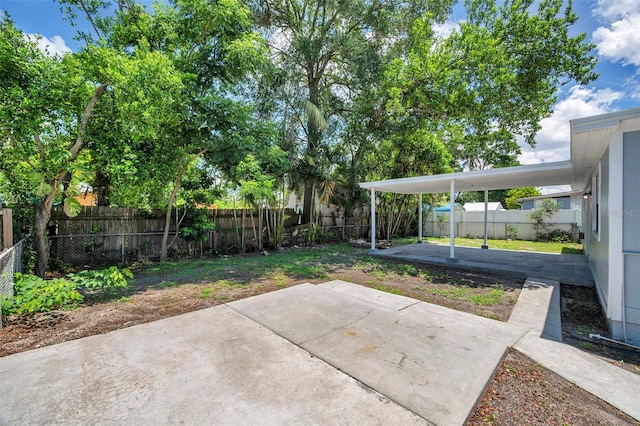 2509 W Crawford St, Tampa, FL 33614 - fenced backyard with a patio area