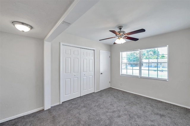 2509 W Crawford St, Tampa, FL 33614 - unfurnished bedroom featuring carpet, a closet, and ceiling fan