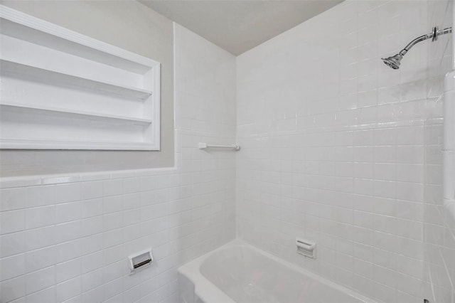 2509 W Crawford St, Tampa, FL 33614 - full bath with bathing tub / shower combination and tile walls