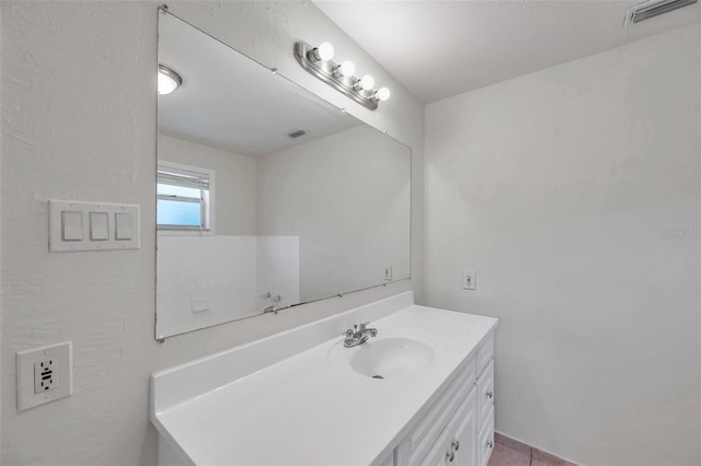 2509 W Crawford St, Tampa, FL 33614 - bathroom featuring vanity and tile patterned floors