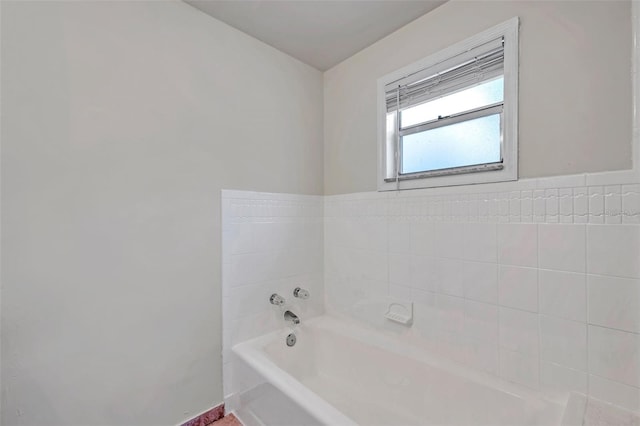 2509 W Crawford St, Tampa, FL 33614 - bathroom featuring a bath and baseboards