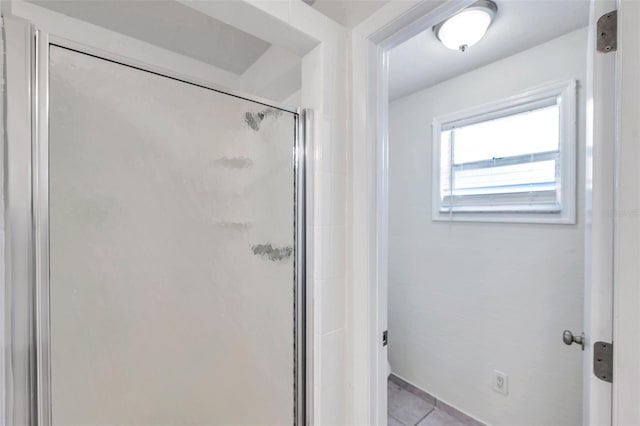 2509 W Crawford St, Tampa, FL 33614 - bathroom with a shower stall and tile patterned floors