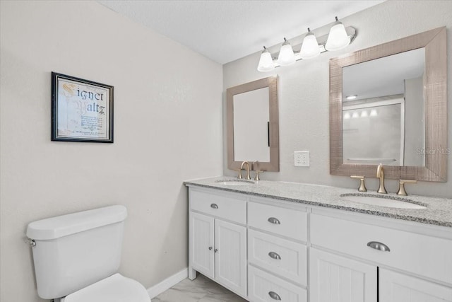 4718 W Oklahoma Ave, Tampa, FL 33616 - bathroom featuring marble finish flooring and double vanity