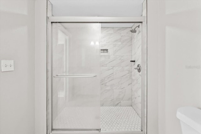 4718 W Oklahoma Ave, Tampa, FL 33616 - bathroom with a shower stall and toilet