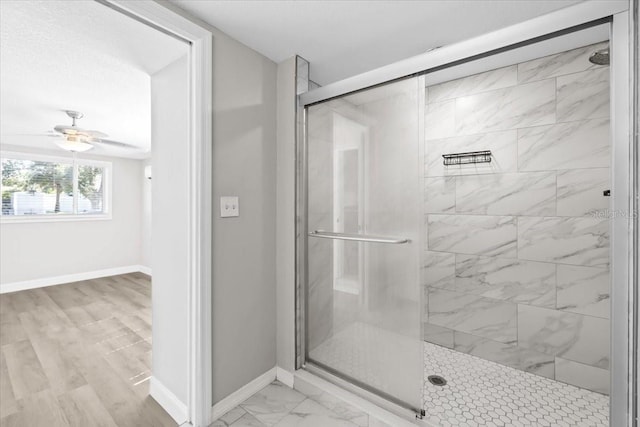 4718 W Oklahoma Ave, Tampa, FL 33616 - full bathroom featuring a shower stall and a ceiling fan
