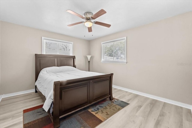 4718 W Oklahoma Ave, Tampa, FL 33616 - bedroom featuring light wood-style flooring and a ceiling fan