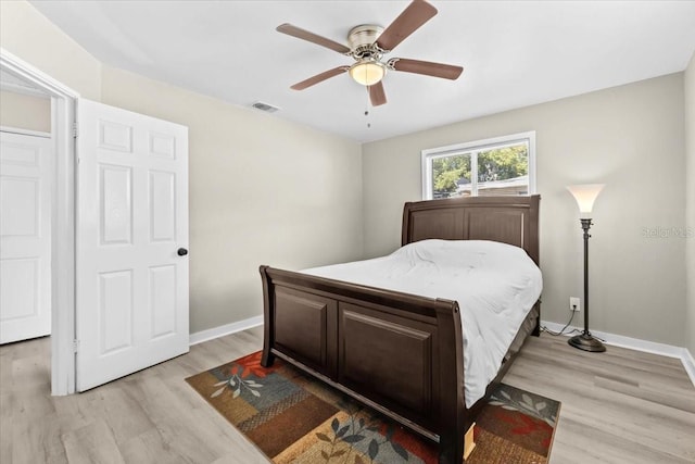 4718 W Oklahoma Ave, Tampa, FL 33616 - bedroom with light wood-style flooring and a ceiling fan