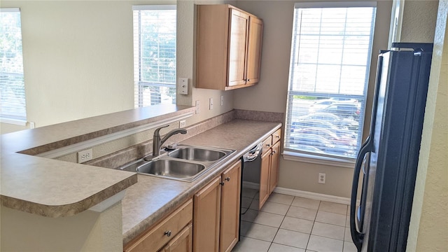 5000 Culbreath Key Way Unit 1-220, Tampa, FL 33611 - kitchen featuring freestanding refrigerator, black dishwasher, and light tile patterned flooring