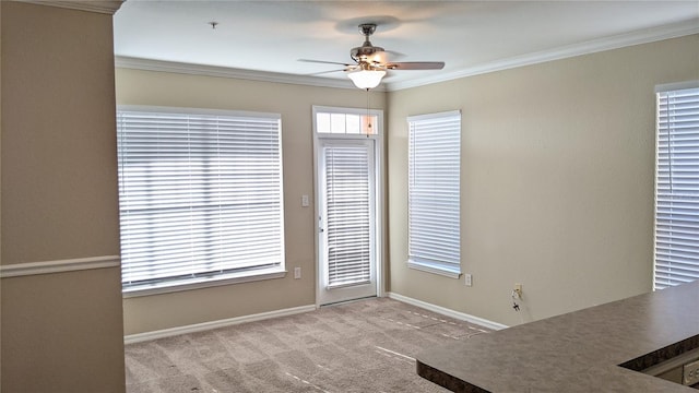 5000 Culbreath Key Way Unit 1-220, Tampa, FL 33611 - unfurnished dining area with a ceiling fan, crown molding, and carpet floors