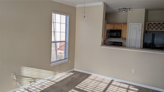 5000 Culbreath Key Way Unit 1-220, Tampa, FL 33611 - kitchen with black appliances, light brown cabinetry, carpet, and crown molding