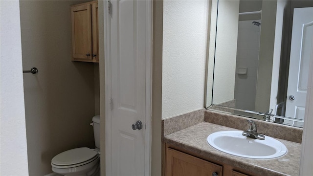 5000 Culbreath Key Way Unit 1-220, Tampa, FL 33611 - bathroom with vanity and a textured wall