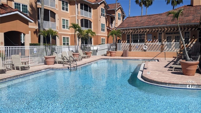 5000 Culbreath Key Way Unit 1-220, Tampa, FL 33611 - community pool featuring a patio