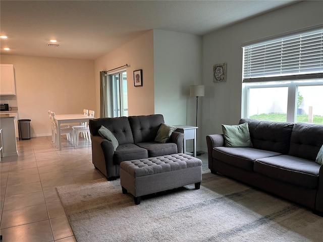 17807 Canopy Pl, Bradenton, FL 34211 - living area featuring light tile patterned flooring and recessed lighting